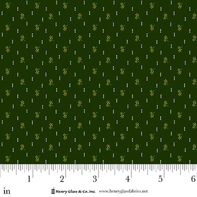 Green fabric with small white and yellow floral pattern.